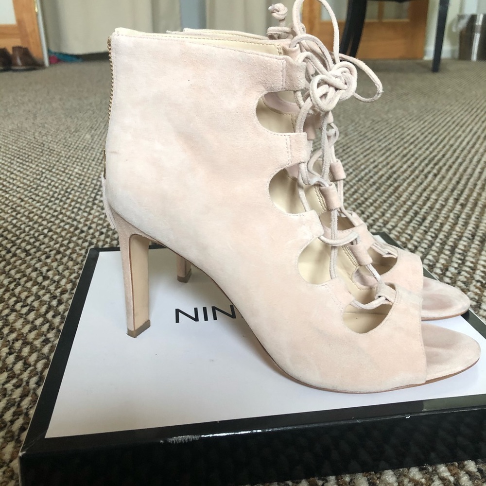 Light pink suede pumps with zipper back